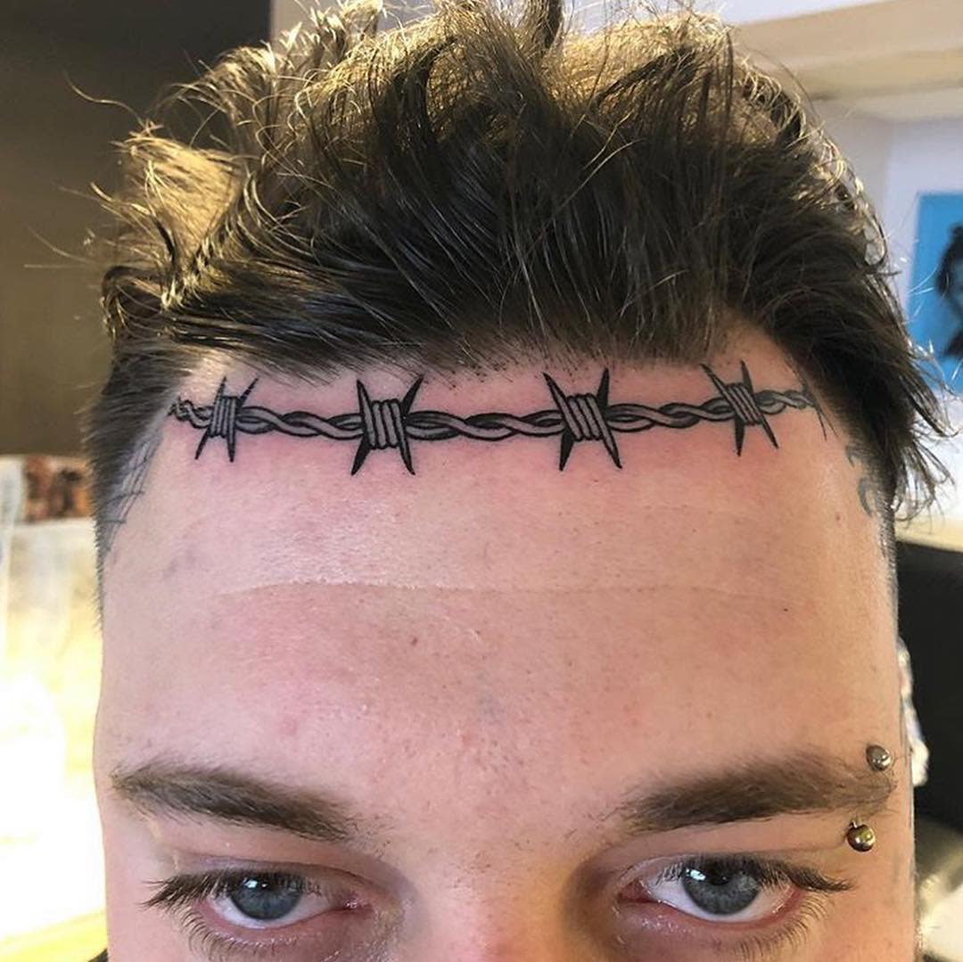 Barbed wire tattoo around hairline